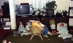 Katherine (Kat) McDougal Wheeler McCandless teacher teaching her stuffed animals, dolls and Andy 
Guess whos the star pupil